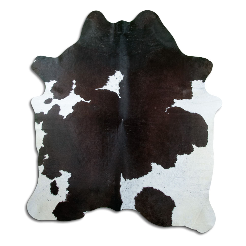 Schwarz-weißes Kuhfell, ca. 200 × 180 cm, von oben fotografiert: genau das Fell, das Sie erhalten