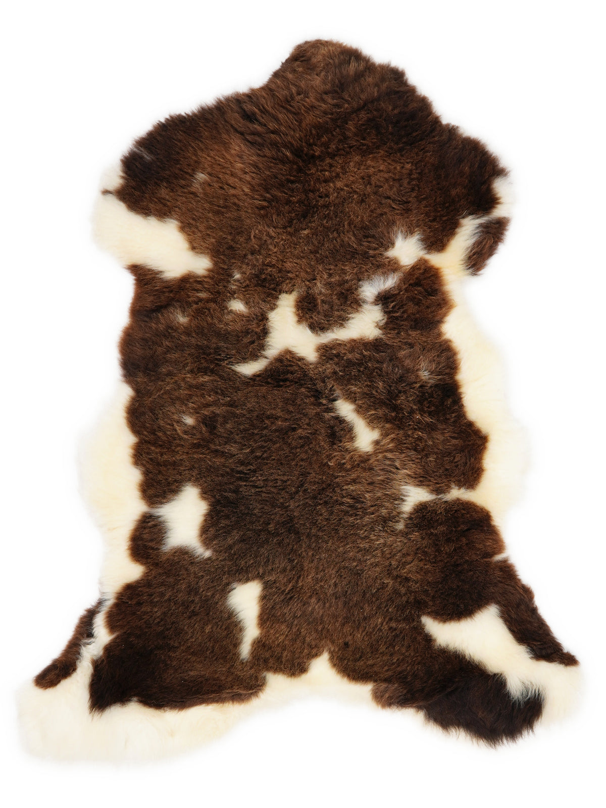 Mehrfarbiges britisches Lammfell, ca. 105 × 65 cm, von oben fotografiert: genau das Fell, das Sie erhalten
