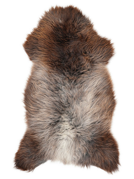 Mehrfarbiges britisches Lammfell, ca. 125 × 60 cm, von oben fotografiert: genau das Fell, das Sie erhalten